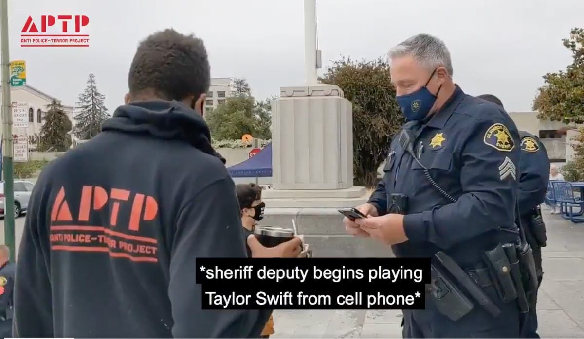 Police officer plays Taylor Swift song to prevent protest video going(01)